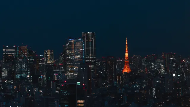 Tokyos nattliga stadssilhuett med Tokyo Tower